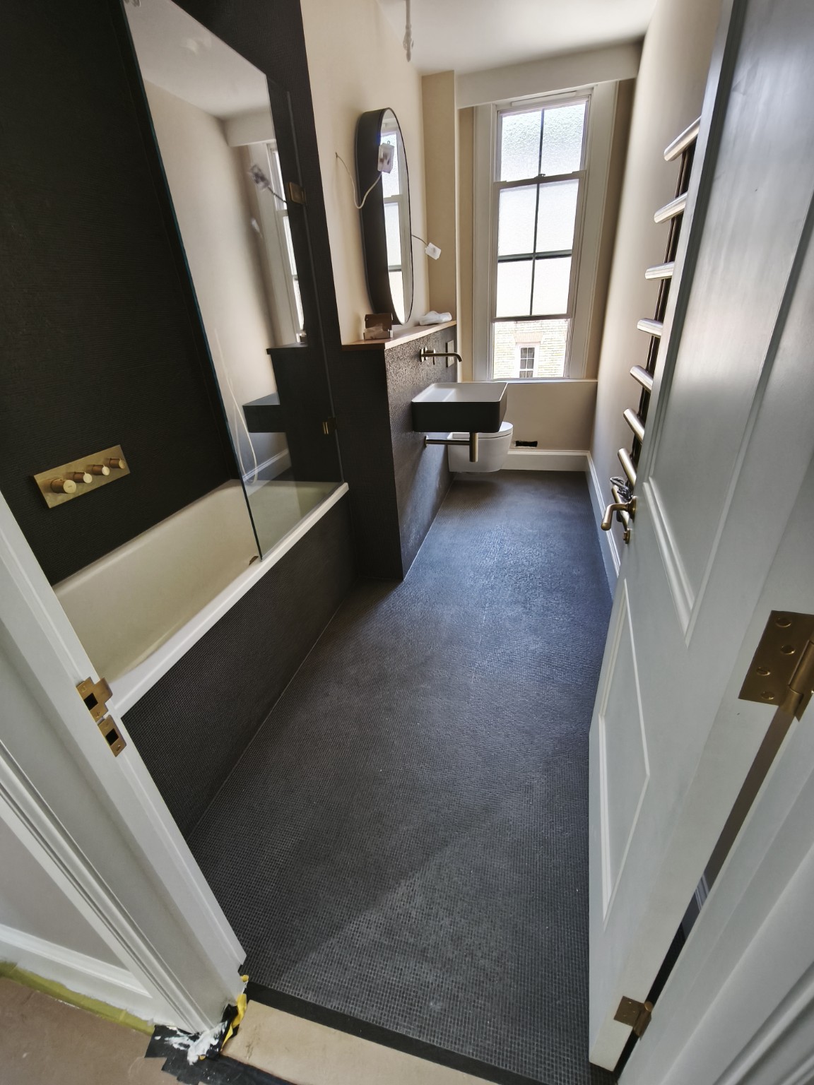 Finished black mosaic bathroom
